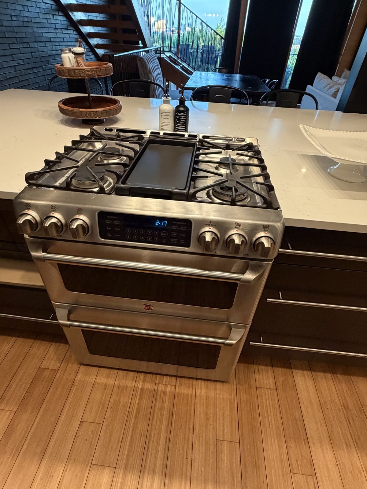 The kitchen detailed down to the stainless stove