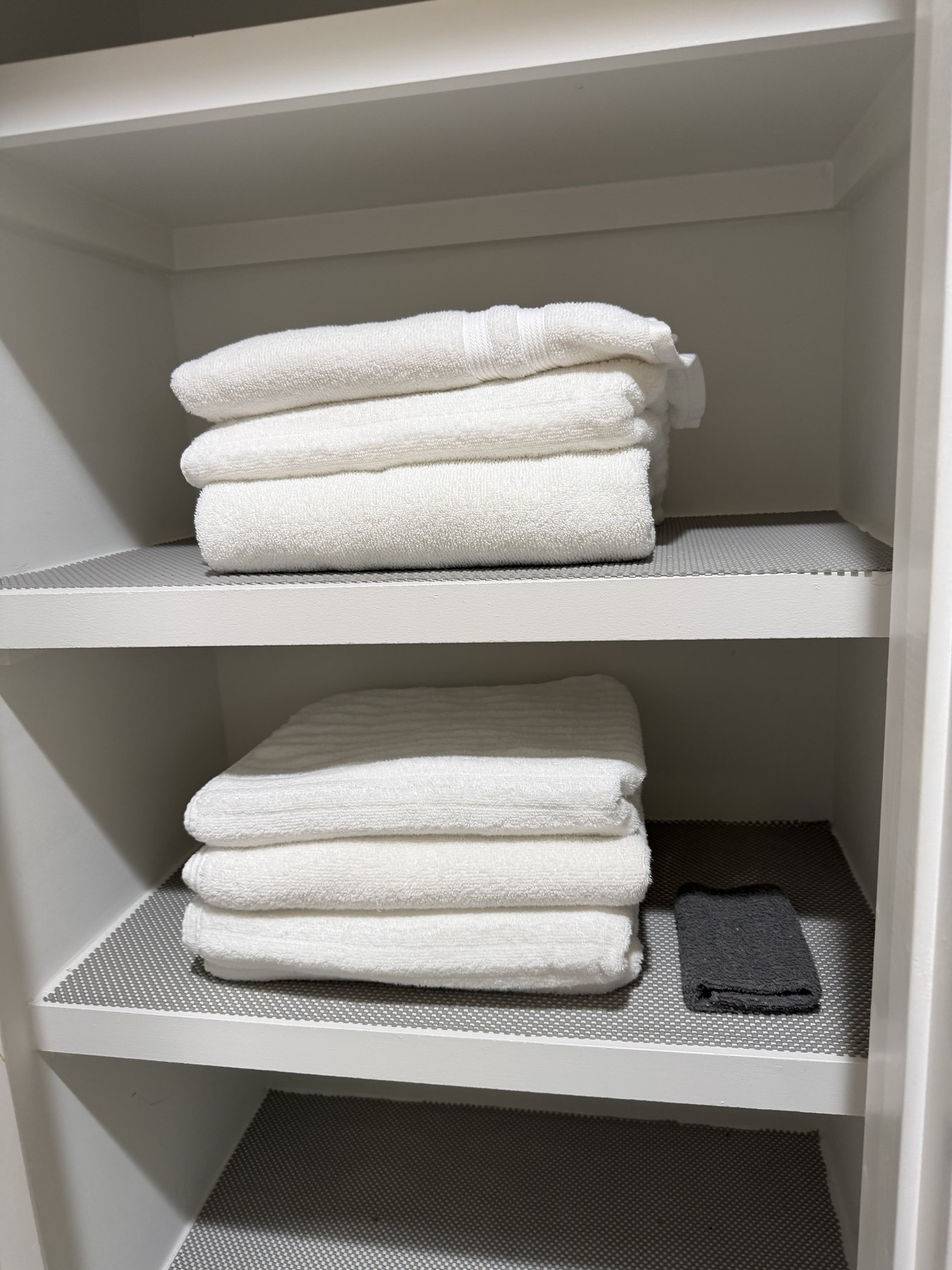 Clean linen shelf before move-in
